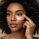 Close-up of a Young Woman with Curly Hair Applying an Eye Patch