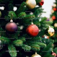 Festive Christmas tree decorated with colorful baubles