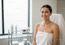 Young Woman Receiving Facial Treatment in Modern Spa