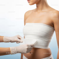 Close-Up of Woman Receiving Bandage Application on Shoulder