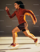Athletic woman sprinting indoors with dynamic motion blur