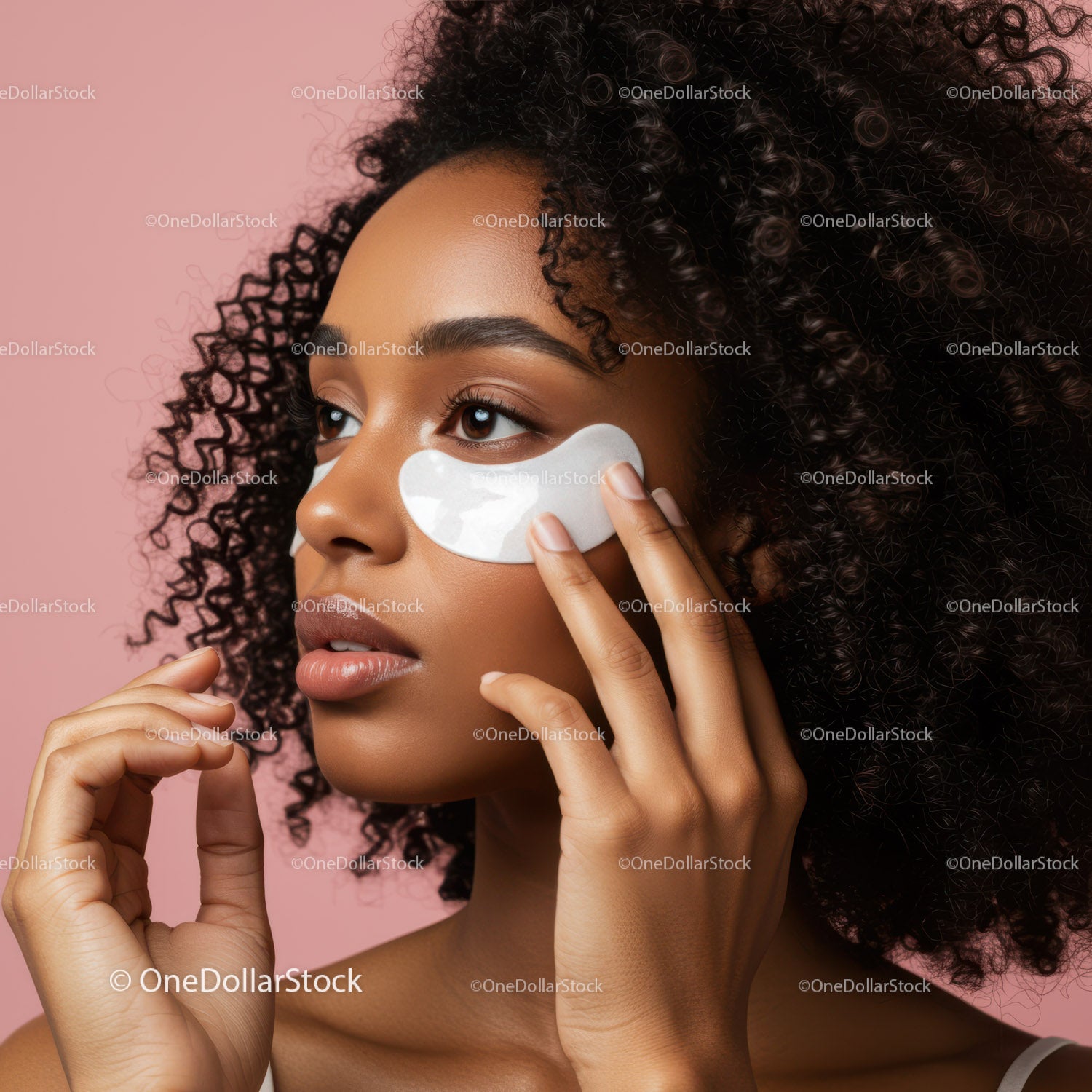 Beautiful Woman Applying Facial Eye Mask for Skin Rejuvenation