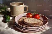 Fresh Sliced Bread with Tomatoes and Cucumber on Pink Plates