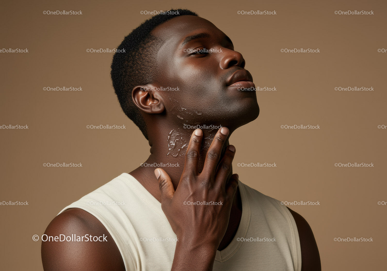 Close Up of Young Black Man Skincare Routine Relaxed Pose