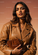Elegant Woman Wearing Leather Coat and Holding a Brown Handbag