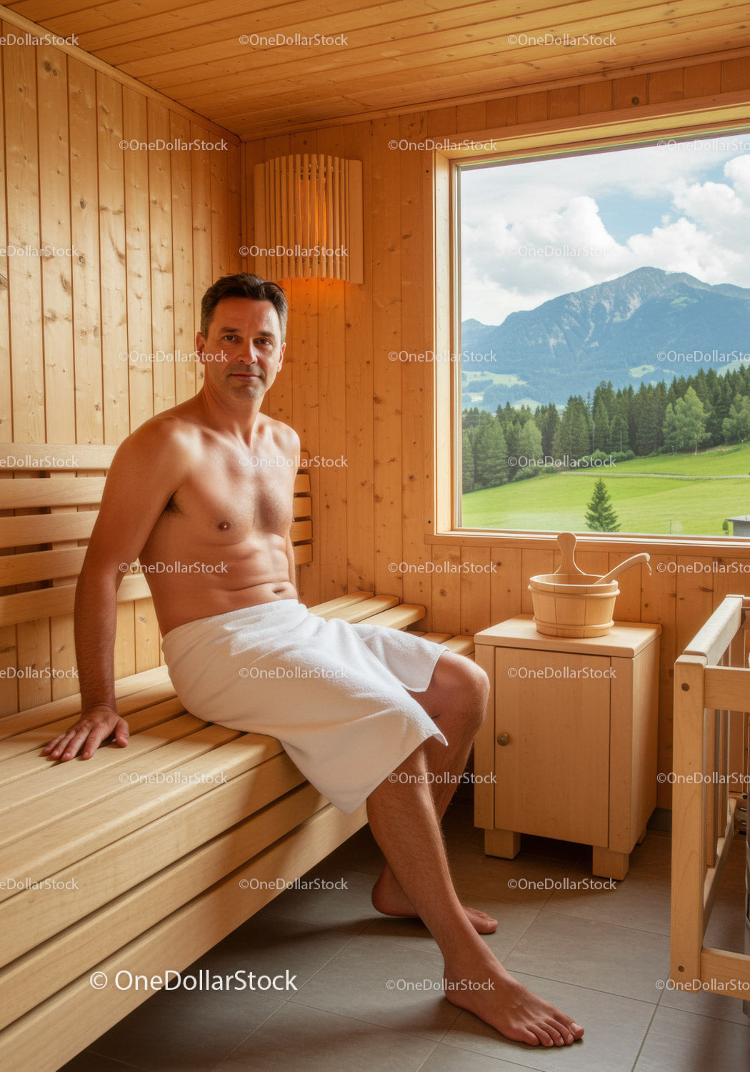 Man Relaxing in Wooden Sauna with Mountain View