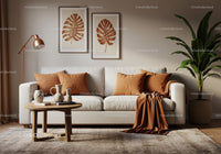 Cozy beige sofa with orange accents in modern living room