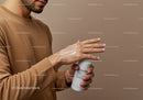 Male Hand Applying Moisturizer On Skin For Skincare Routine