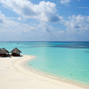 Tropical Beach with Wooden Huts and Crystal Clear Turquoise Water