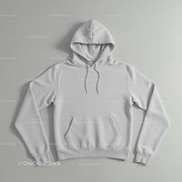 Minimalistic white hoodie laid flat on neutral background