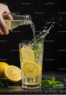 Refreshing Lemonade with Mint Splashing in Glass