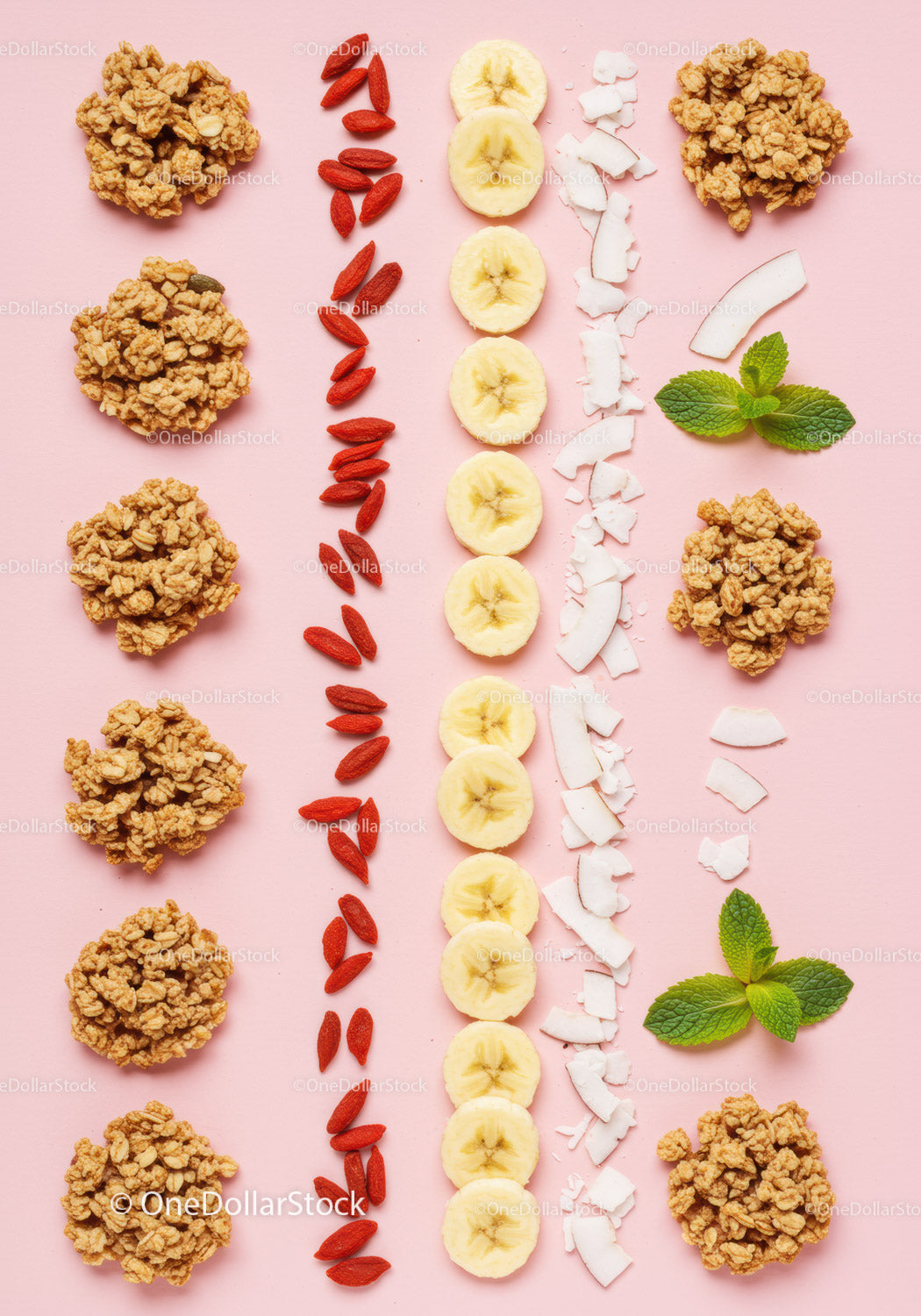 Healthy breakfast ingredients neatly arranged on pink