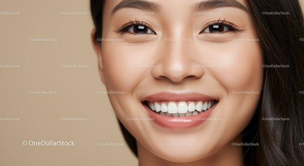 Close up of young woman smiling with flawless skin