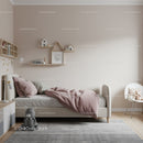 Cozy Children's Bedroom with Soft Pastel Decor and Plush Toys