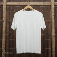 Plain white t-shirt hanging on rustic wooden background