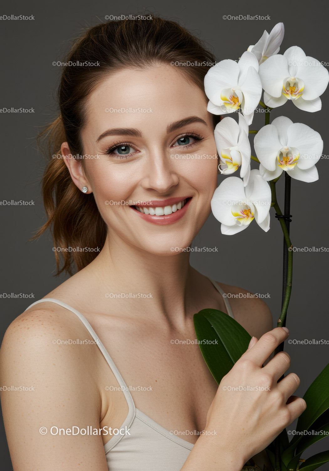 Portrait of a Smiling Woman with White Orchid Flowers Beauty and Wellness