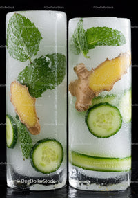 Refreshing ice cubes with mint cucumber and ginger slices