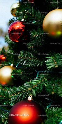 Festive Christmas tree decorated with vibrant baubles