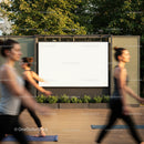 Group practicing yoga in outdoor urban space
