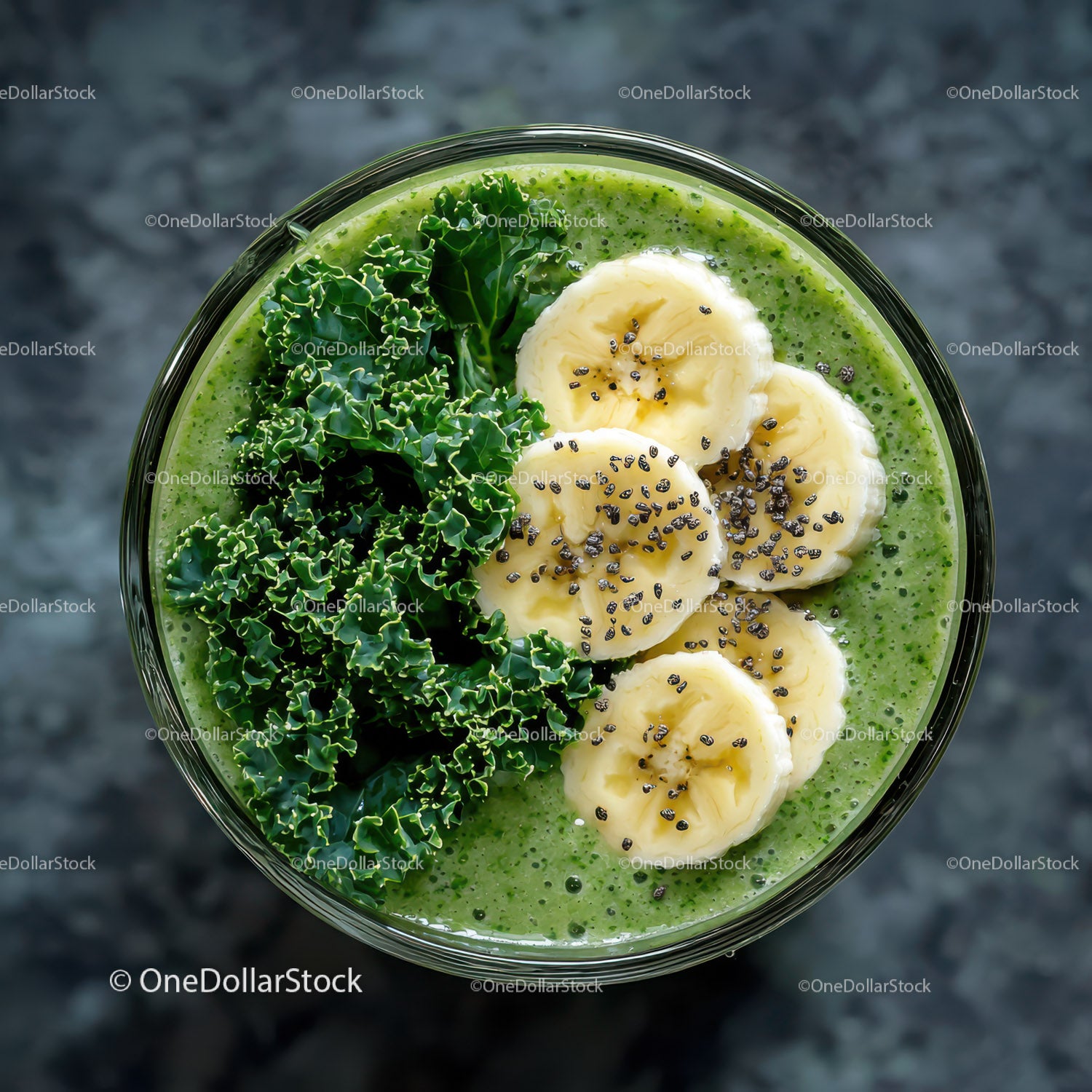 Fresh Green Smoothie with Banana Slices and Kale Leaves