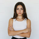 Confident Young Woman Portrait with Crossed Arms and Natural Look