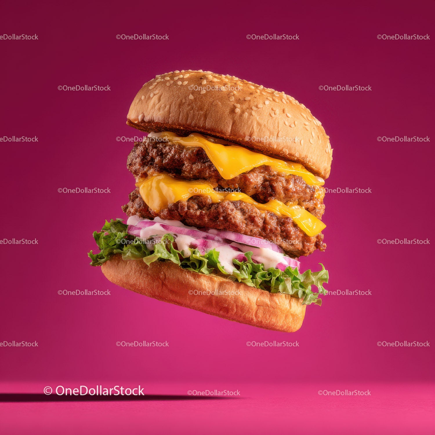 Juicy Double Cheeseburger with Bacon and Lettuce on Sesame Bun