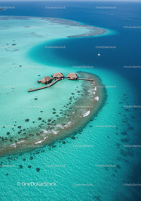 Overwater Bungalows on Tropical Island with Turquoise Reefs and Sailing Boat