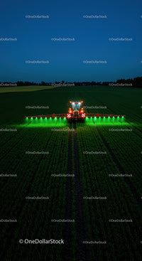 Nighttime Field Work with Modern Farming Equipment