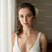 Elegant Young Woman with Green Eyes and Sunlight Shadow