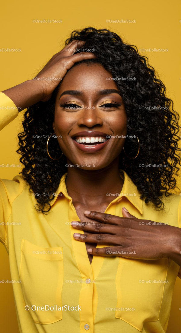 Vibrant Woman Smiling in Yellow Shirt with Curly Hair on Yellow Background