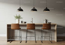 Modern Minimalist Kitchen with Bar Stools and Green Plant