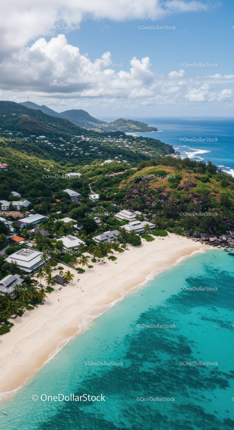 Tropical Beach with Lush Green Hills and Clear Turquoise Water
