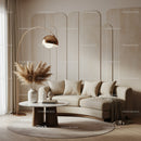 Cozy beige living room with curved sofa and modern decor