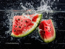 Juicy Watermelon Slices Splashing in Water for Refreshing Summer