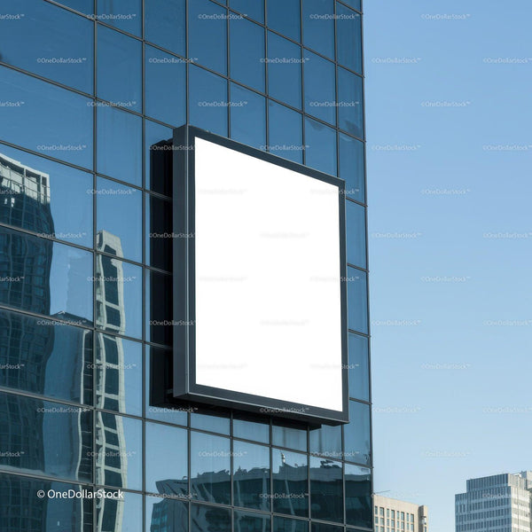 Blank billboard on modern glass office building facade JPG Mockup Image