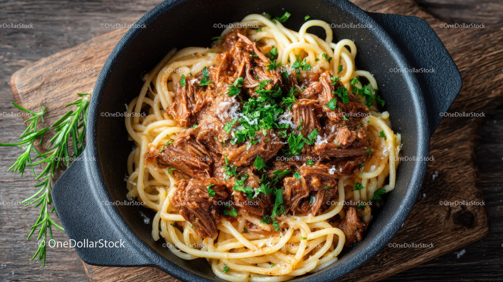 Beef Stew with Pasta in a Black Cast Iron Skillet