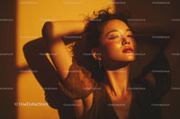 Sunbathing Woman with Radiant Skin Relaxing Outdoors at Sunset