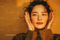 Close-up of a Freckled Woman Listening to Music with Headphones