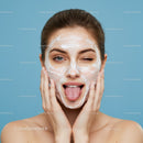 Woman Applying Facial Mask for Skincare and Beauty at Home