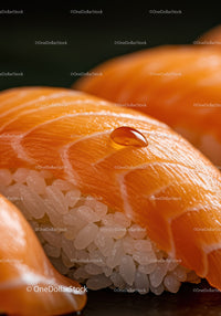 Closeup of fresh salmon nigiri sushi with glistening drop