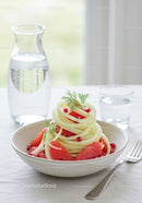 Fresh cucumber salad with grapefruit and pomegranate seeds