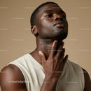 Close-Up of Confident Black Man in Trendy Style with Minimal Background