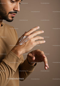 Close-Up of Man Applying Hand Lotion for Skin Care Routine