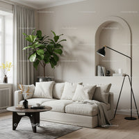 Cozy living room with neutral sofa and lush indoor plant