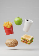 Floating fast food items with a fresh green apple