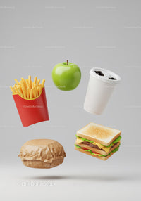 Floating fast food items with a fresh green apple