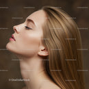 Profile of serene woman with flowing blonde hair