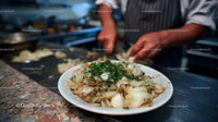 Hands of a Chef Preparing Fresh Chopped Onions in Kitchen