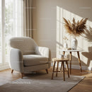 Cozy armchair and side tables in bright living room