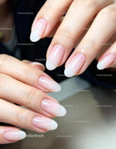 Close up of hands with natural ombre manicure